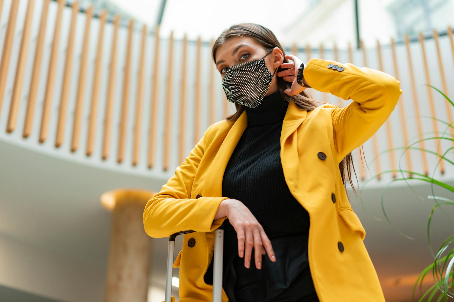 Woman adjusting the fit of her women's motorcycle jacket before riding