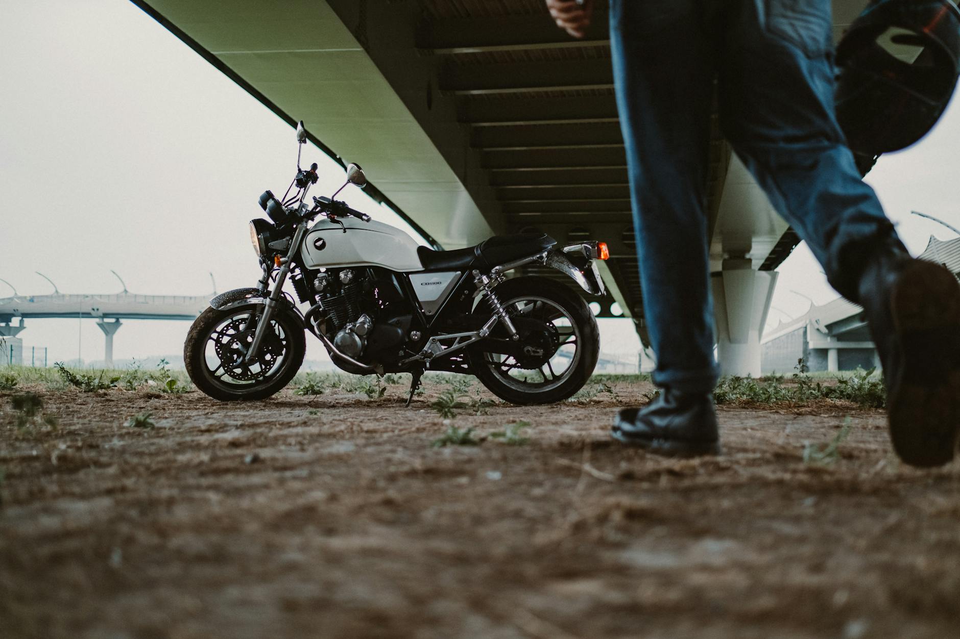 Confident woman walking comfortably in her new motorcycle ladies boots after a ride